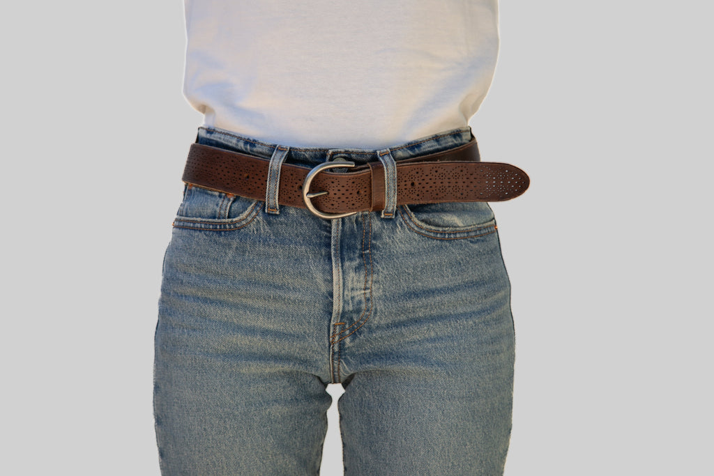 Genuine leather belt with hand punched hole pattern
