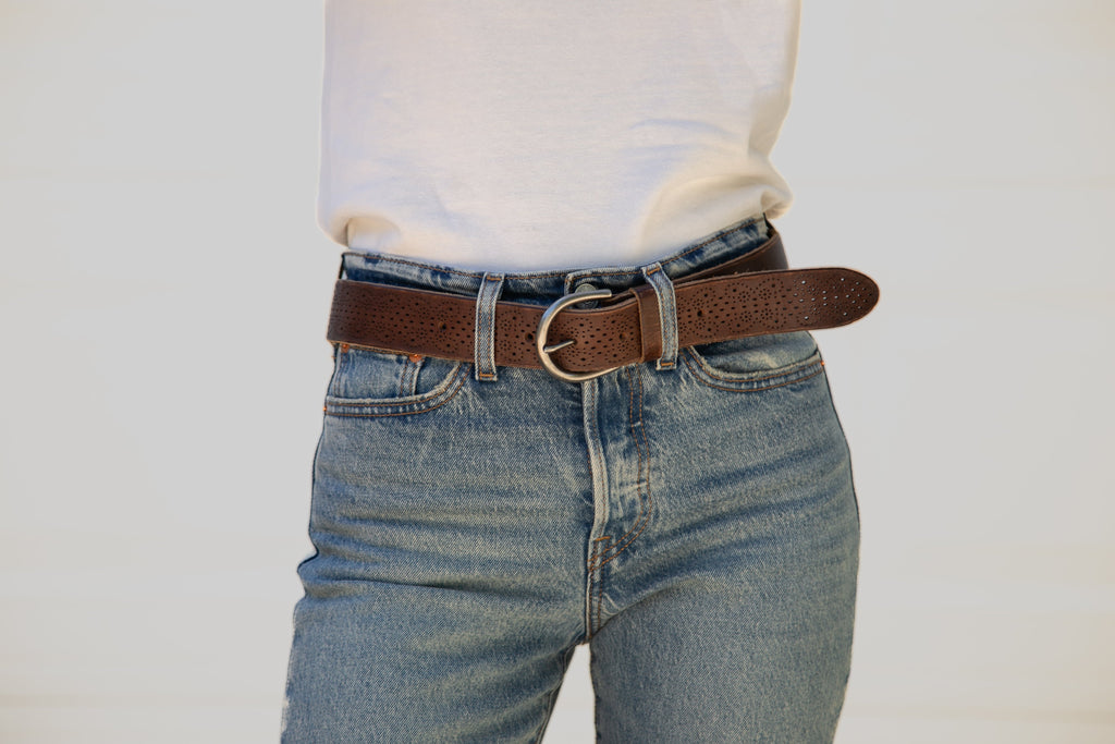 Genuine leather belt with hand punched hole pattern