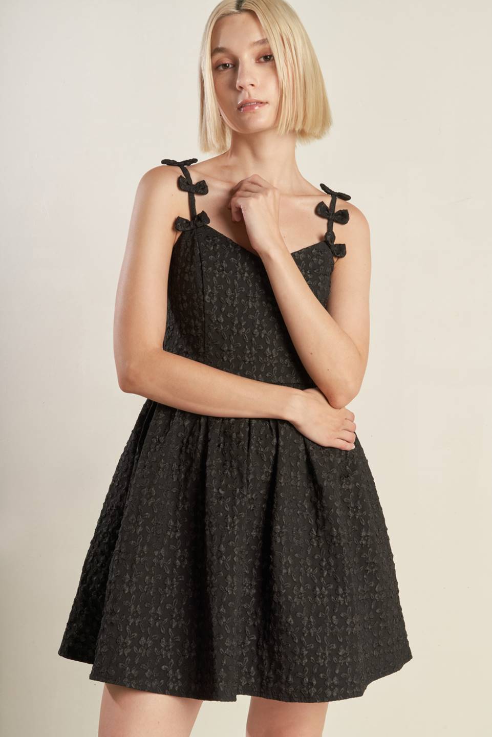 black woven lace mini dress with bow straps