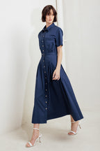 A solid woven midi dress featuring collar, short sleeve, front pocket, button down, self-belt and full skirt