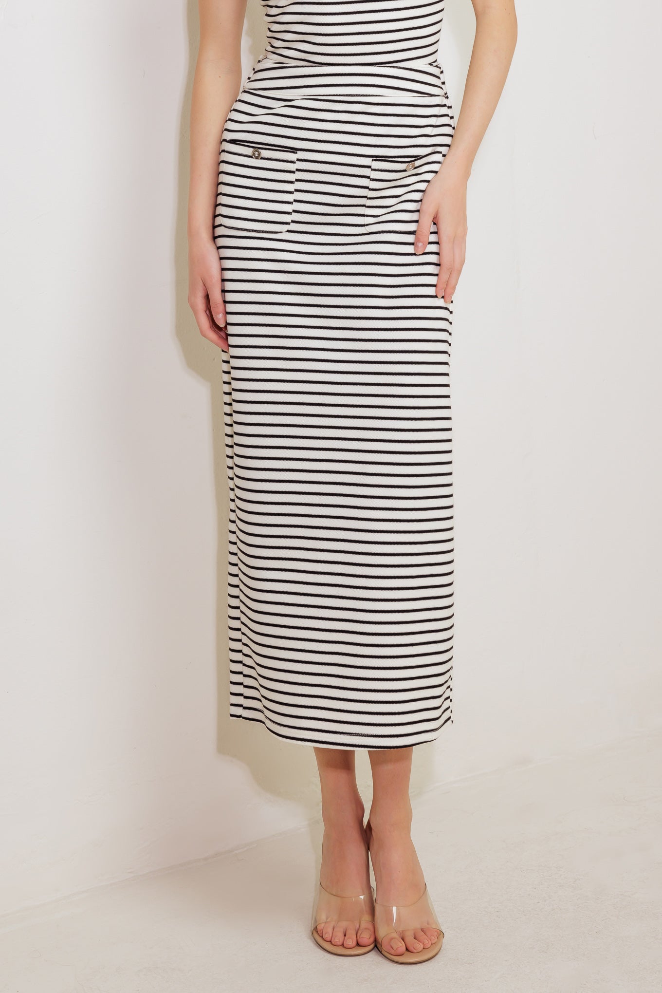 Classic striped midi skirt with front pocket & elasticized waist.