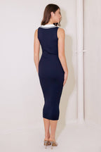 A navy ribbed sweater knit midi dress featuring collar, sleeveless and front button detail