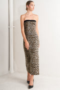 A leopard sweater knit midi dress featuring strapless, contrasting belt and back slit.