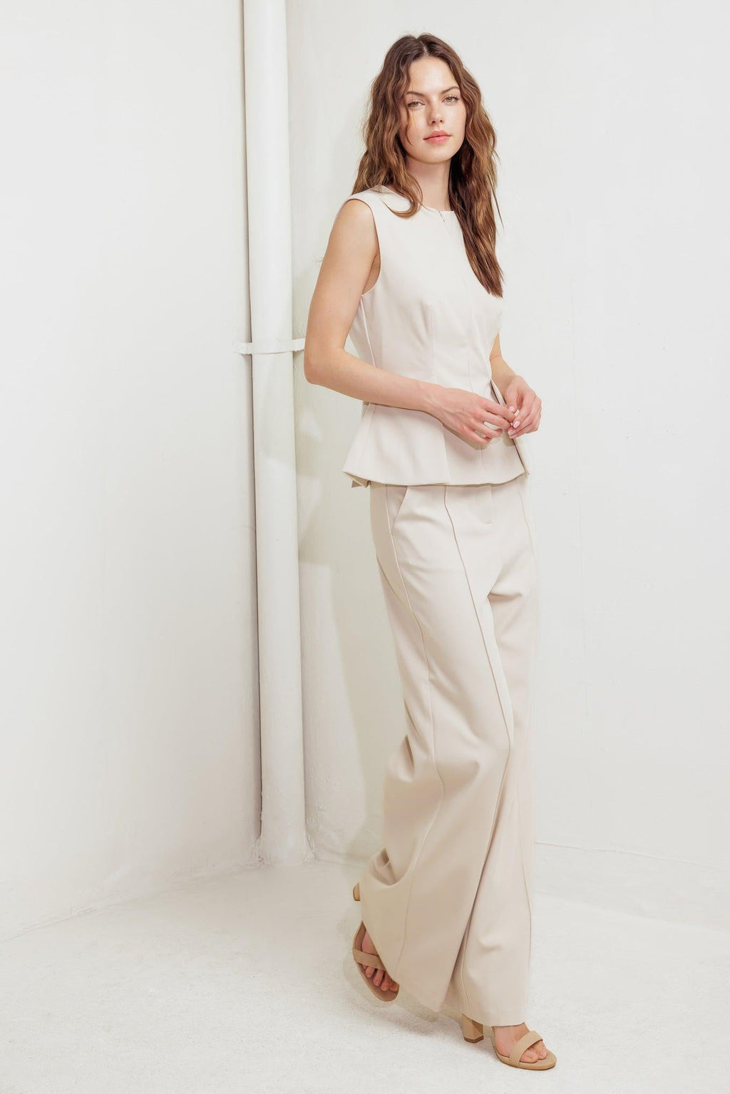 Monday Flow Sleeveless Peplum Top