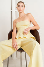 light yellow strapless peplum top