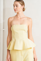 light yellow strapless peplum top