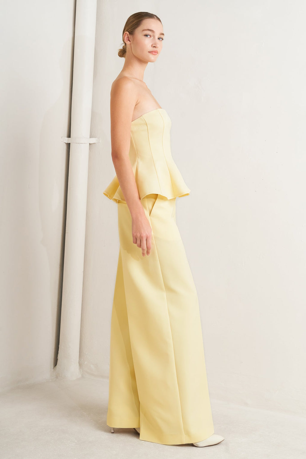 light yellow strapless peplum top