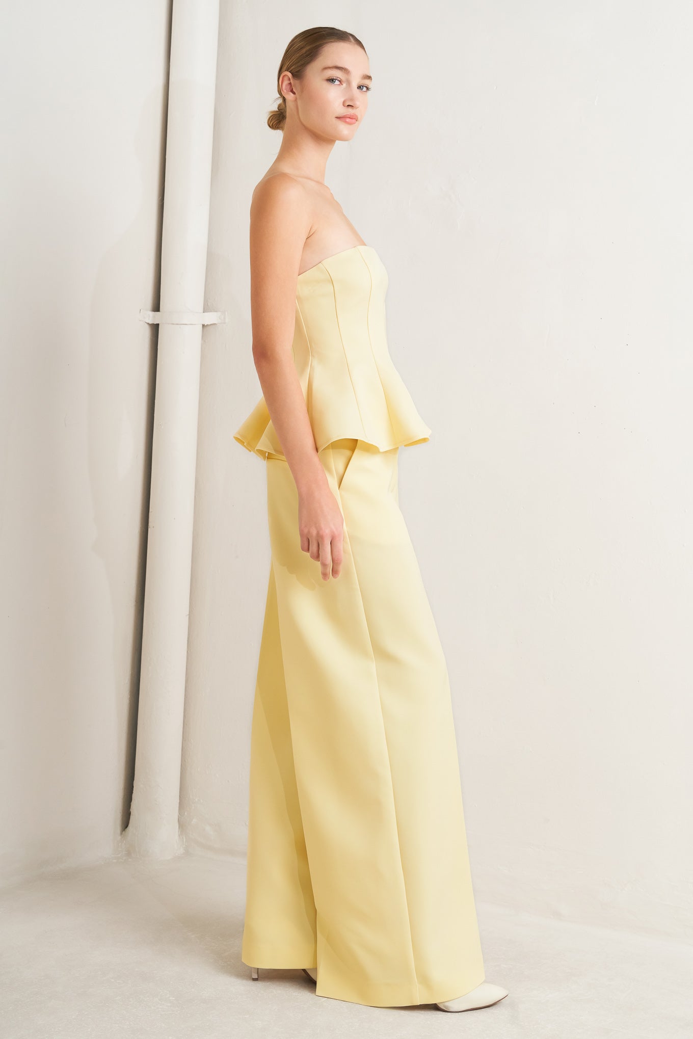 light yellow strapless peplum top