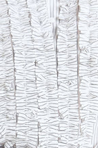 DAYLIGHT EDGE WOVEN TOP