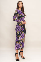 A printed power mesh midi dress featuring body contouring, round neckline, long sleeve and back neck button closure
