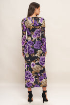 A printed power mesh midi dress featuring body contouring, round neckline, long sleeve and back neck button closure