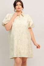 A floral textured woven mini dress featuring collar, short puff short and front button-down closure