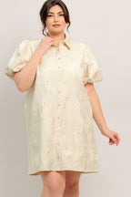 A floral textured woven mini dress featuring collar, short puff short and front button-down closure