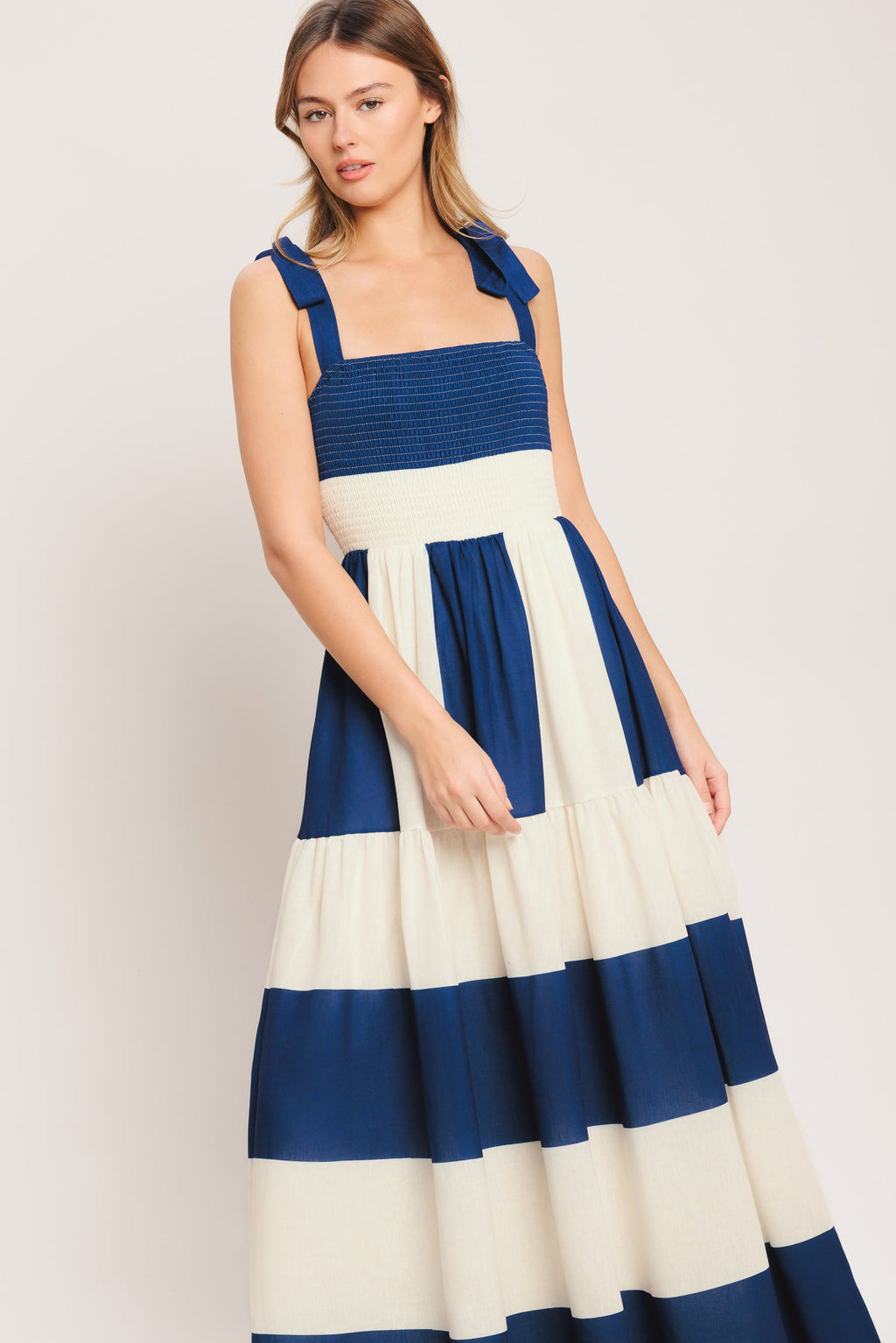 blue/off white striped maxi dress with shoulder ties, smocked bodice and tiered skirt