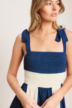 blue/off white striped maxi dress with shoulder ties, smocked bodice and tiered skirt