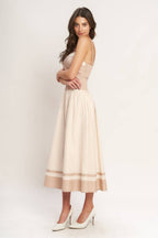 Color blocked midi dress with straight neckline, drop waist, full skirt, and smocked back