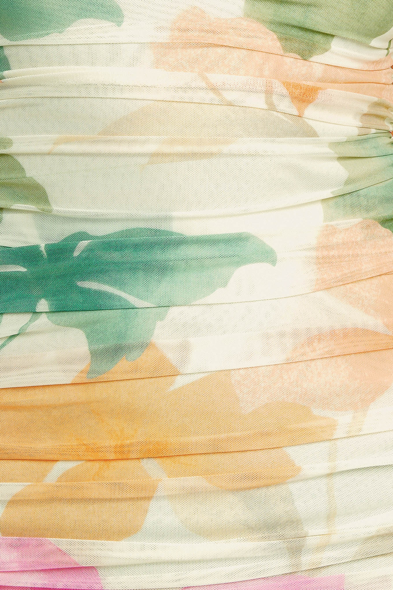 A colorful printed power mesh midi dress featuring tubular neckline, sleeveless, shirred side, body contouring and back zipper closure