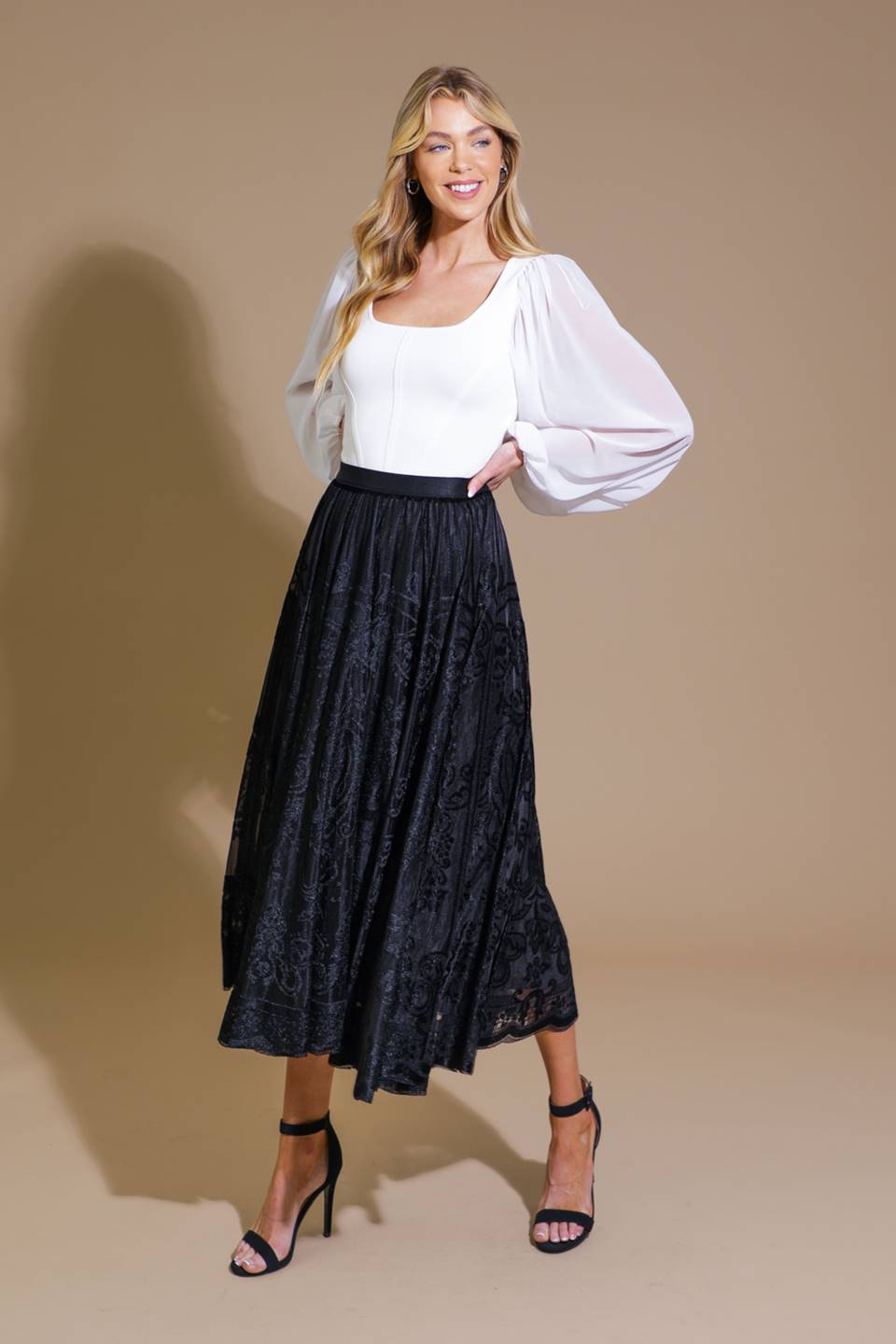 A burnout velvet midi skirt with elasticized waist