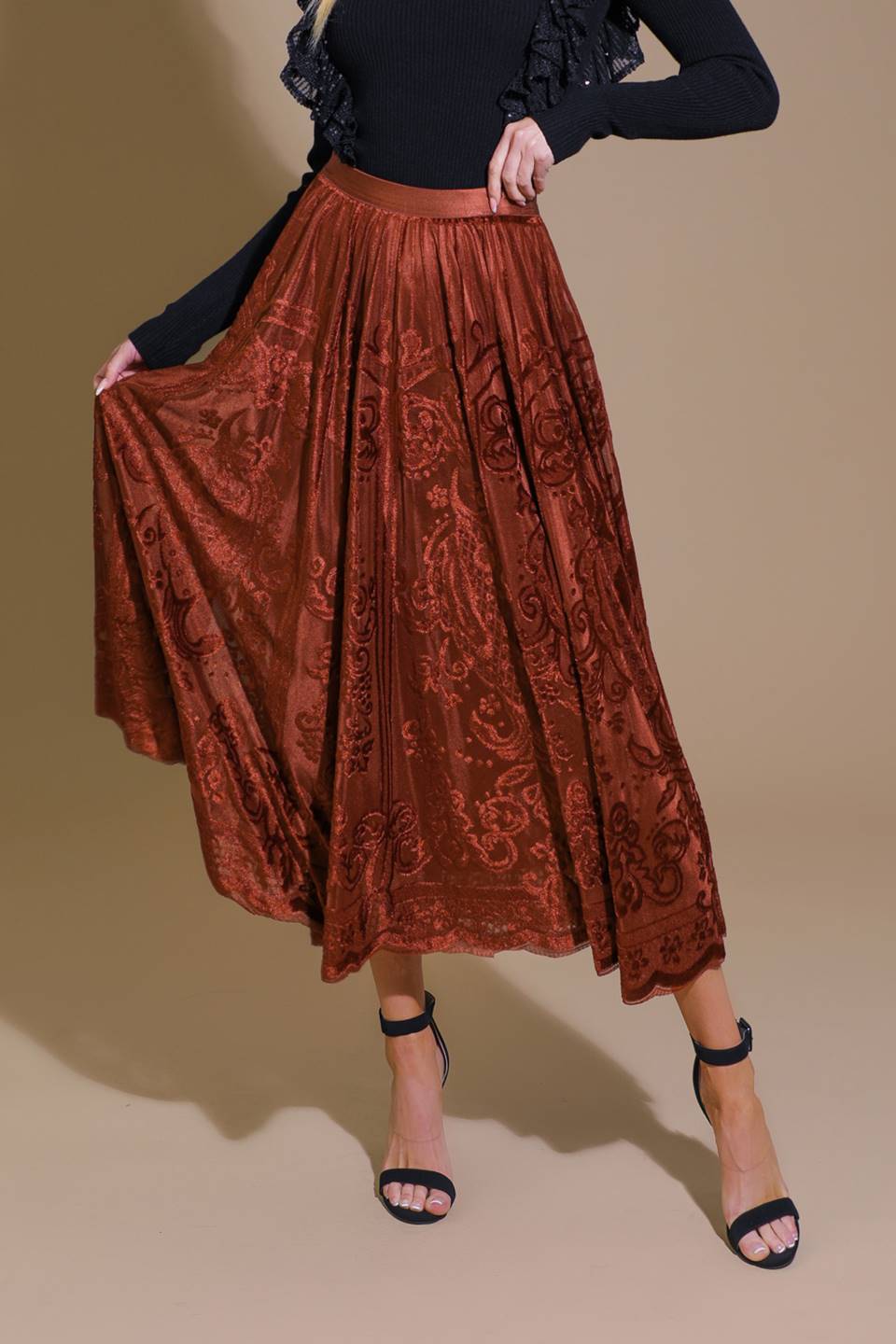 A burnout velvet midi skirt with elasticized waist