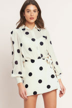 A Black/Ivory polka dot printed woven top featuring collar, button down, long sleeve with cuff and cami.