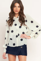 A Black/Ivory polka dot printed woven top featuring collar, button down, long sleeve with cuff and cami.