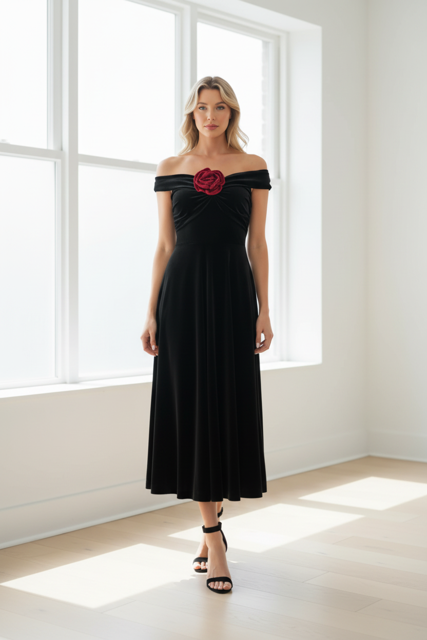 Clear lifestyle shot of black velvet dress by window